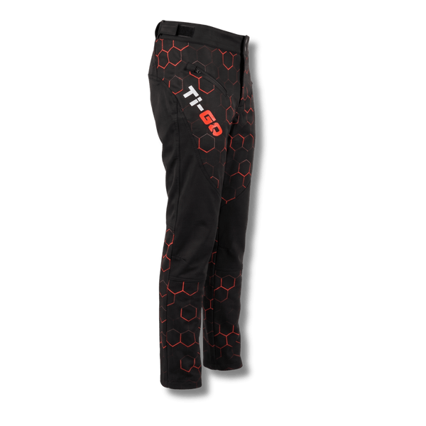 Side view of Ti-GO kids riding pants showing Velcro waist adjuster and zipped thigh pocket