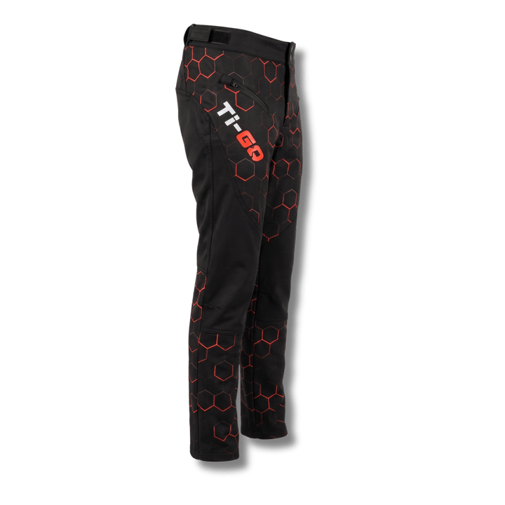 Side view of Ti-GO kids riding pants showing Velcro waist adjuster and zipped thigh pocket