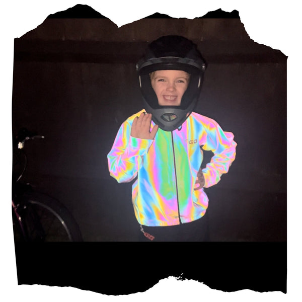 Ti-GO 'Now You See Me' kids' iridescent reflective cycling jacket – lifestyle photo